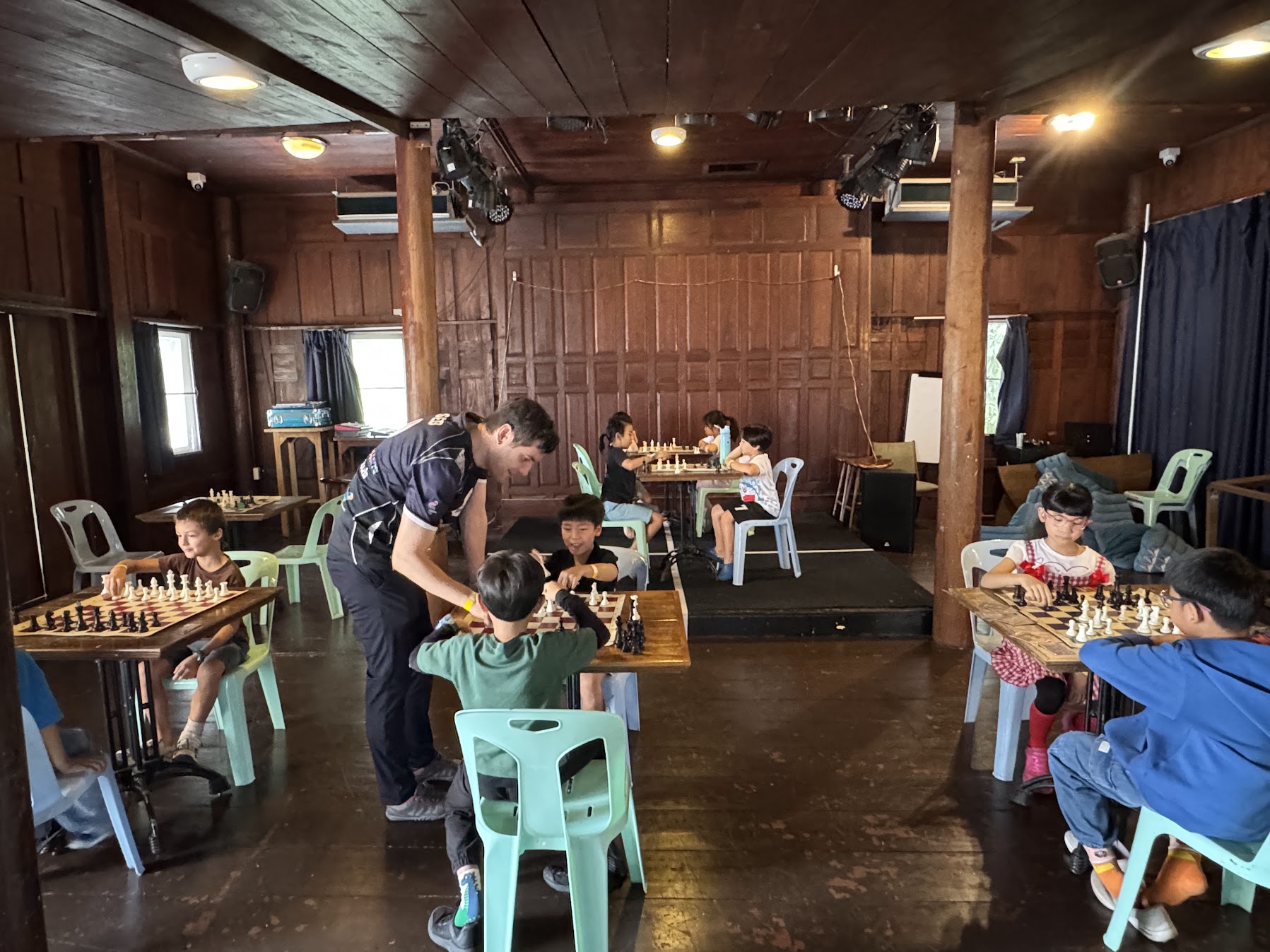 Kids playing chess games at Blue Parrot Bangkok
